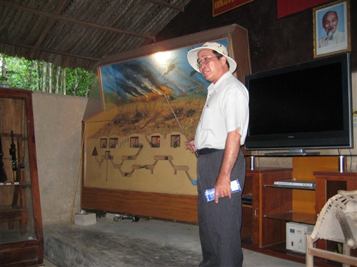 045 Cu Chi tunnels introduction from our tour guide.jpg